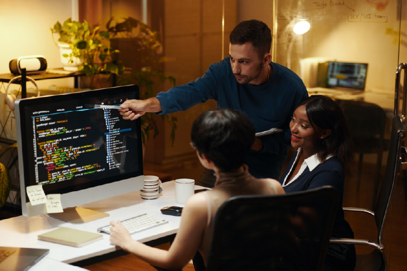 Developer Coding a Website Builder App